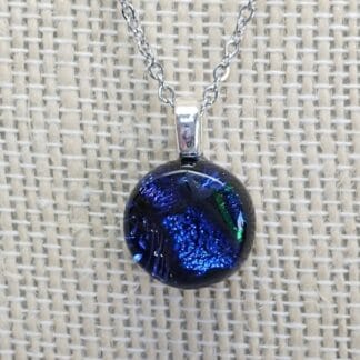Small 16mm dichroic glass pendant. DarteGlass is a woman owned brand.
