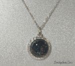 Art Deco Designed Glass Pendant in Decorative Stainless Steel Setting