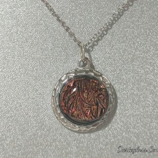 Amber Glass Pendant in Decorative Stainless Steel Setting. Handcrafted by DarteGlass, a woman-owned business