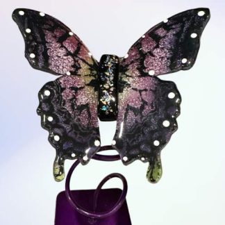 Ashes in a glass butterfly, mounted on a powder coated frame