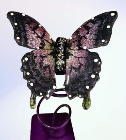 Ashes in a glass butterfly, mounted on a powder coated frame