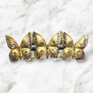 Gold toned barrette with 3 butterflies