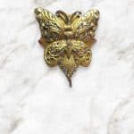 Three Wing Paisley Gold Toned Butterfly Pony Tail Cover